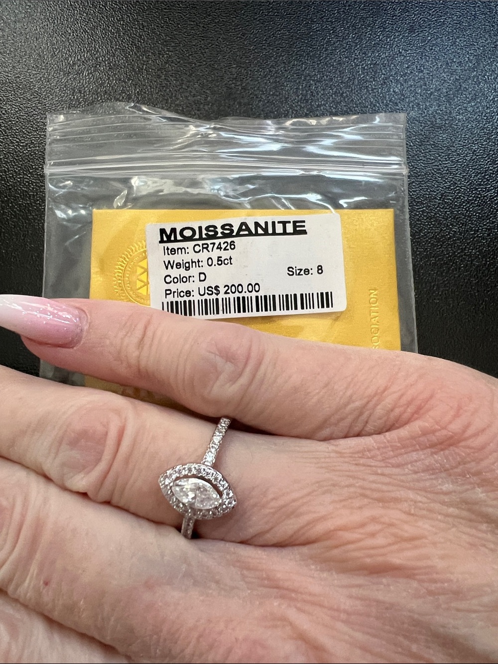Marquise Halo Ring in White Gold Tone